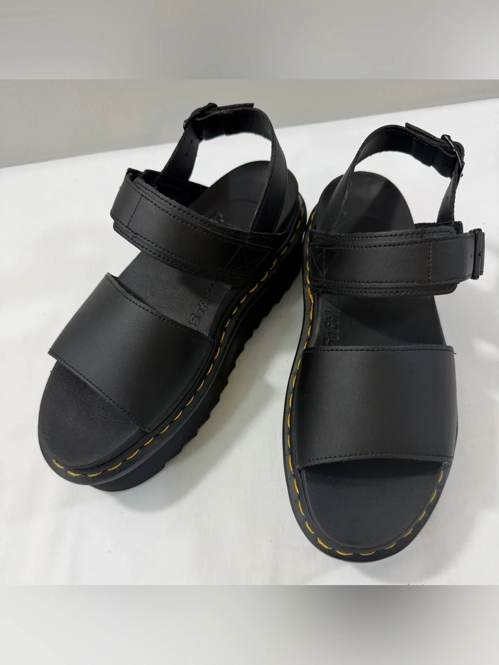 Dr. Martens Black Leather Platform Women’s Sandals with Yellow Stitching